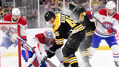 Boston Bruins forward Cole Koepke and Montreal Canadiens goaltender Cayden Primeau