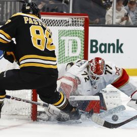 Boston Bruins forward David Pastrnak and Florida Panthers goalie Sergei Bobrovsky