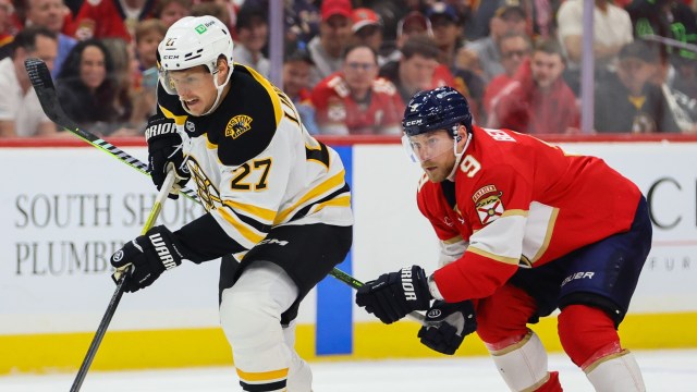 Boston Bruins defenseman Hampus Lindholm and Florida Panthers forward Sam Bennett