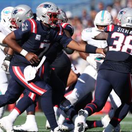 New England Patriots quarterback Jacoby Brissett and running back Rhamondre Stevenson