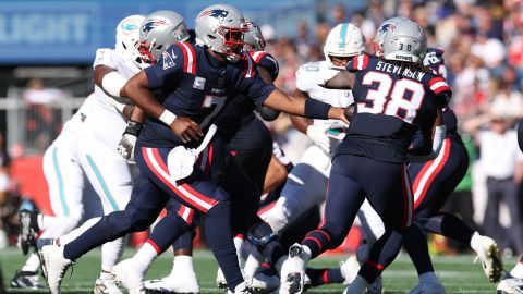 New England Patriots quarterback Jacoby Brissett and running back Rhamondre Stevenson