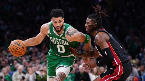 Boston Celtics forward Jayson Tatum and Milwaukee Bucks guard Delon Wright