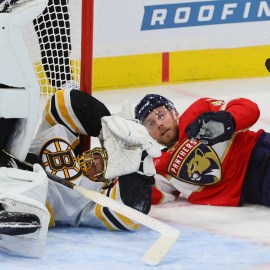 Boston Bruins goaltender Joonas Korpisalo and Florida Panthers forward Sam Bennett