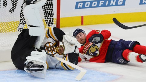 Boston Bruins goaltender Joonas Korpisalo and Florida Panthers forward Sam Bennett