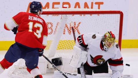 Boston Bruins goaltender Joonas Korpisalo and Florida Panthers forward Sam Reinhart