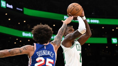 Boston Celtics guard Lonnie Walker IV and Philadelphia 76ers guard Lester Quinones