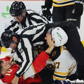 Boston Bruins forward Mark Kastelic and Florida Panthers forward A.J. Greer