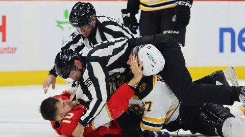 Boston Bruins forward Mark Kastelic and Florida Panthers forward A.J. Greer