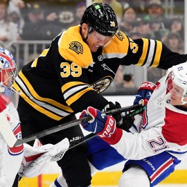 Boston Bruins forward Morgan Geekie and Montreal Canadiens defenseman Kaiden Guhle and goaltender Cayden Primeau