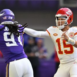 Minnesota Vikings linebacker Patrick Jones II and Kansas City Chiefs quarterback Patrick Mahomes