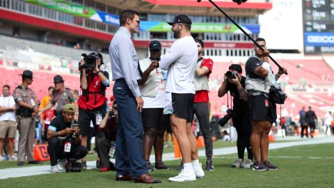 Former NFL quarterback Tom Brady and Tampa Bay Buccaneers quarterback Baker Mayfield