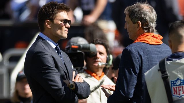 Former NFL quarterbacks Tom Brady and Bernie Kosar