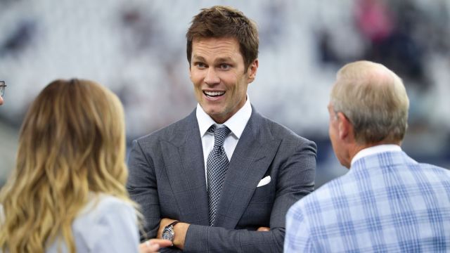 Former NFL quarterback Tom Brady and FOX broadcasters Erin Andrews and Tom Rinaldi