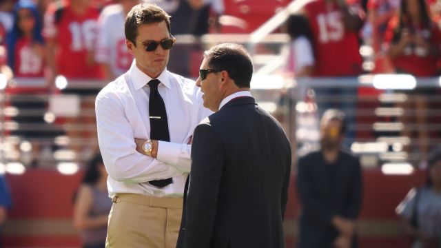 Former NFL quarterback Tom Brady and San Francisco 49ers executive Jed York