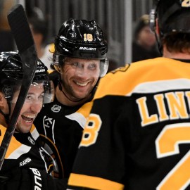 Boston Bruins forwards Tyler Johnson, Pavel Zacha and Elias Lindholm