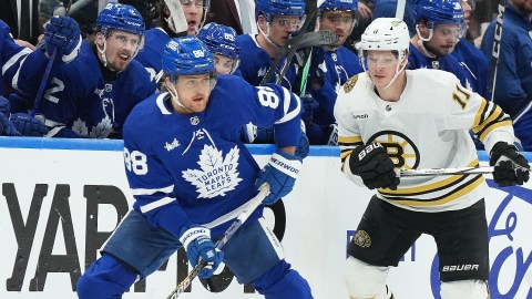 Boston Bruins forward Trent Frederic and Toronto Maple Leafs forward William Nylander