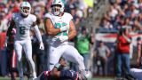 Miami Dolphins defensive tackle Zach Sieler and New England Patriots quarterback Jacoby Brissett