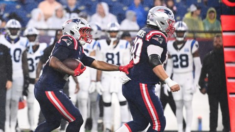 New England Patriots center David Andrews (60) blocks for running back Antonio Gibson