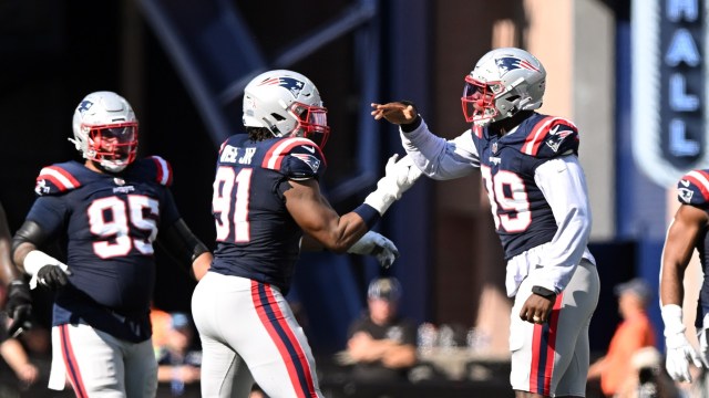 New England Patriots defensive ends Deatrich Wise Jr., Keion White