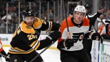 Boston Bruins center Elias Lindholm, Philadelphia Flyers defenseman Nick Seeler