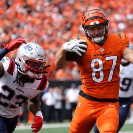 New England Patriots safety Kyle Dugger, Cincinnati Bengals tight end Tanner Hudson