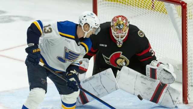 Ottawa Senators goalie Linus Ullmark, St. Louis Blues forward Alexey Toropchenko