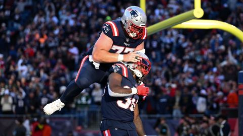 New England Patriots running back Rhamondre Stevenson and center Ben Brown