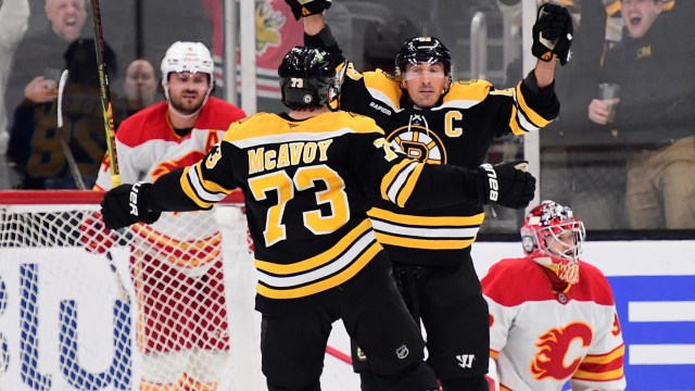 Boston Bruins forward Brad Marchand and defenseman Charlie McAvoy