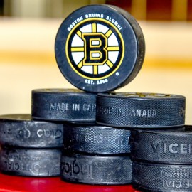 Bruins Alumni Association pucks