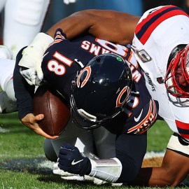 New England Patriots defensive end Deatrich Wise and Chicago Bears quarterback Caleb Williams