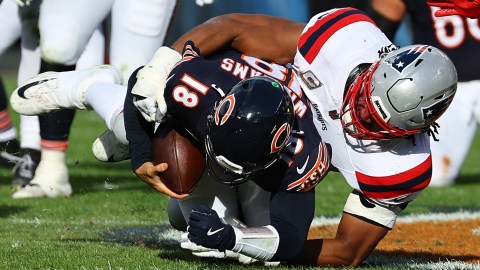 New England Patriots defensive end Deatrich Wise and Chicago Bears quarterback Caleb Williams