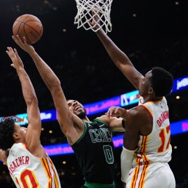 Boston Celtics forward Jayson Tatum and Atlanta Hawks teammates Onyeka Okongwu and Zaccharie Risacher