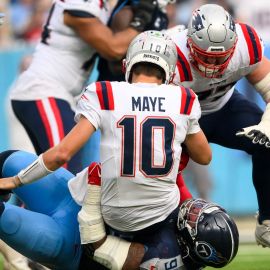 Tennessee Titans defensive tackle Jeffery Simmons and New England Patriots quarterback Drake Maye