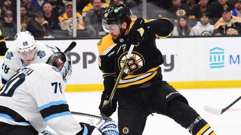 Boston Bruins forward Justin Brazeau and Utah Hockey Club goaltender Karel Vejmelka