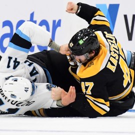 Boston Bruins forward Mark Kastelic and Utah Hockey Club defenseman Robert Bortuzzo