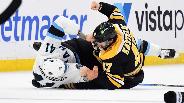 Boston Bruins forward Mark Kastelic and Utah Hockey Club defenseman Robert Bortuzzo