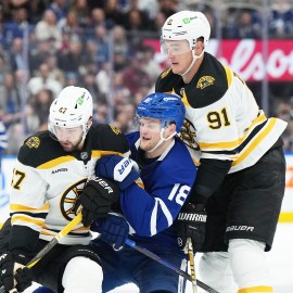 Boston Bruins forward Mark Kastelic and defenseman Nikita Zadorov and Toronto Maple Leafs forward Steven Lorentz