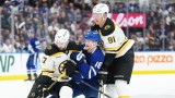 Boston Bruins forward Mark Kastelic and defenseman Nikita Zadorov and Toronto Maple Leafs forward Steven Lorentz