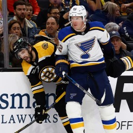 St. Louis Blues defenseman Ryan Suter and Boston Bruins forward Mark Kastelic