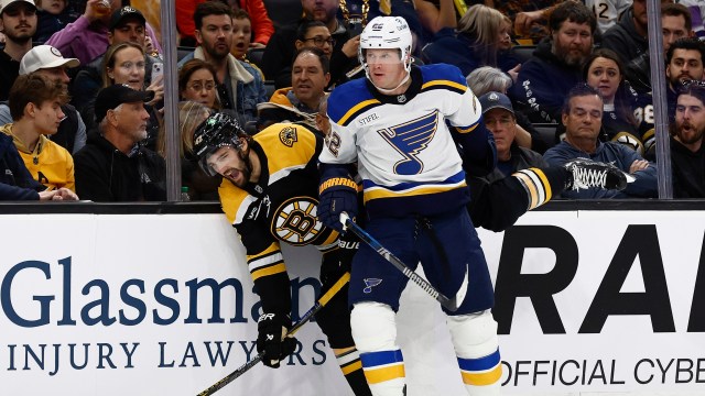 St. Louis Blues defenseman Ryan Suter and Boston Bruins forward Mark Kastelic