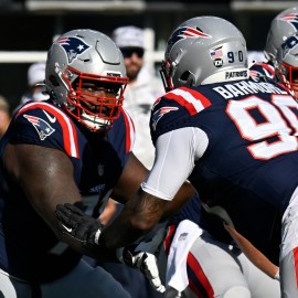 New England Patriots offensive lineman Mike Onwenu and defensive lineman Christian Barmore