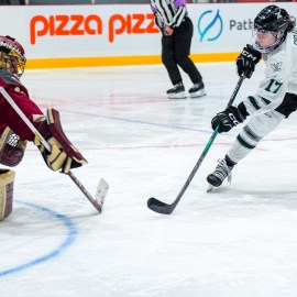 Boston Fleet forward Taylor Girard and Montreal Victoire goalie Ann-Renee Desbiens