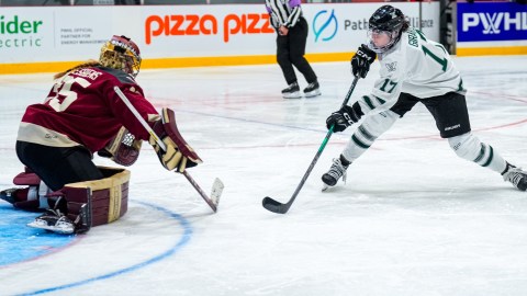 Boston Fleet forward Taylor Girard and Montreal Victoire goalie Ann-Renee Desbiens