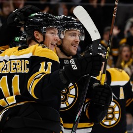 Boston Bruins forwards Trent Frederic and Charlie Coyle