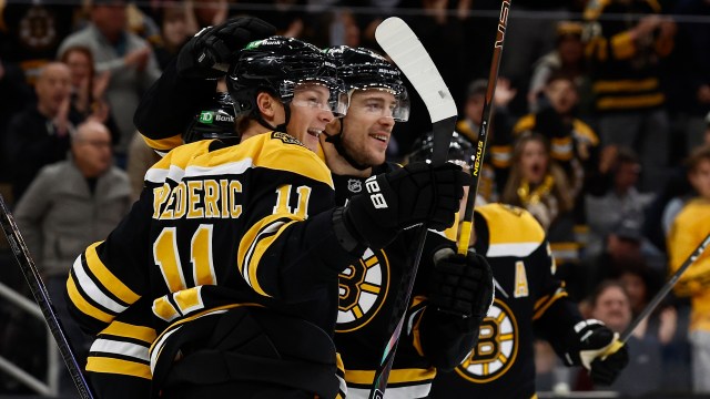 Boston Bruins forwards Trent Frederic and Charlie Coyle