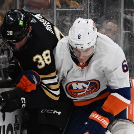 Boston Bruins forward Patrick Brown, New York Islanders defenseman Ryan Pulock