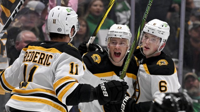 Boston Bruins forwards Trent Frederic, Charlie Coyle defenseman Mason Lohrei