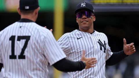 New York Yankees manager Aaron Boone and MLB outfielder Juan Soto