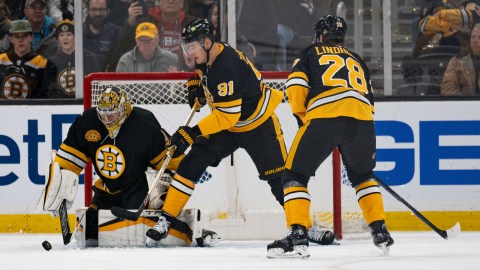 Boston Bruins goaltender Jeremy Swayman, defenseman Nikita Zadorov and forward Elias Lindholm