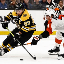 Boston Bruins captain Brad Marchand and Philadelphia Flyers forward Tyson Foerster